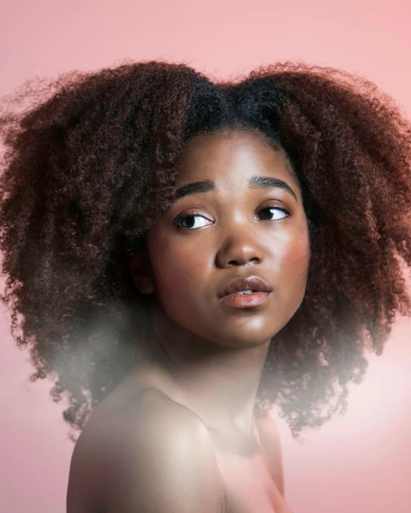 AI hair color changer before — Amara's untouched dark brown hair